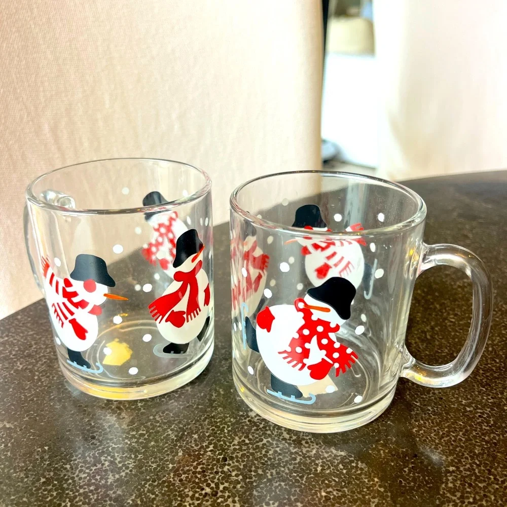 New set of 2 Crate & Barrel skating snowman mugs made in the USA
